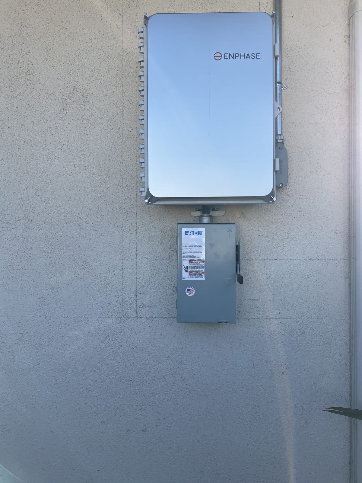 Enphase IQ home battery with Eaton disconnect installed on an exterior wall in Rolling Hills Estates, CA