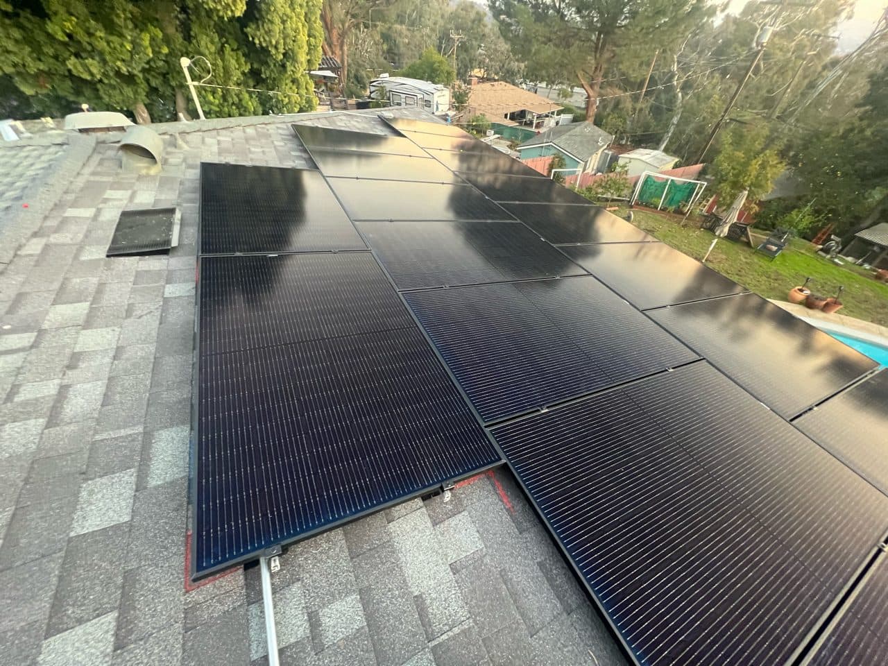 All-black solar panel array on a foothill home in Altadena, CA installed by Helios Energy Global
